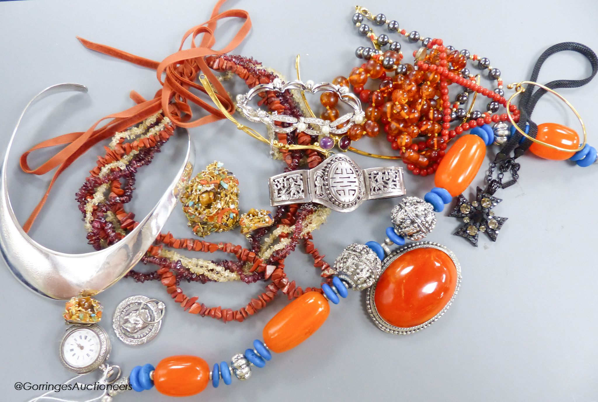 An Eastern heavy white metal and amber (?) ethnic style necklace, a multi-strand necklace by Picketts of London (boxed), a pocket watch and a collection of costume jewellery